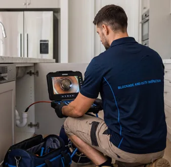 Clearing a blocked sink at a Hunters Hill property